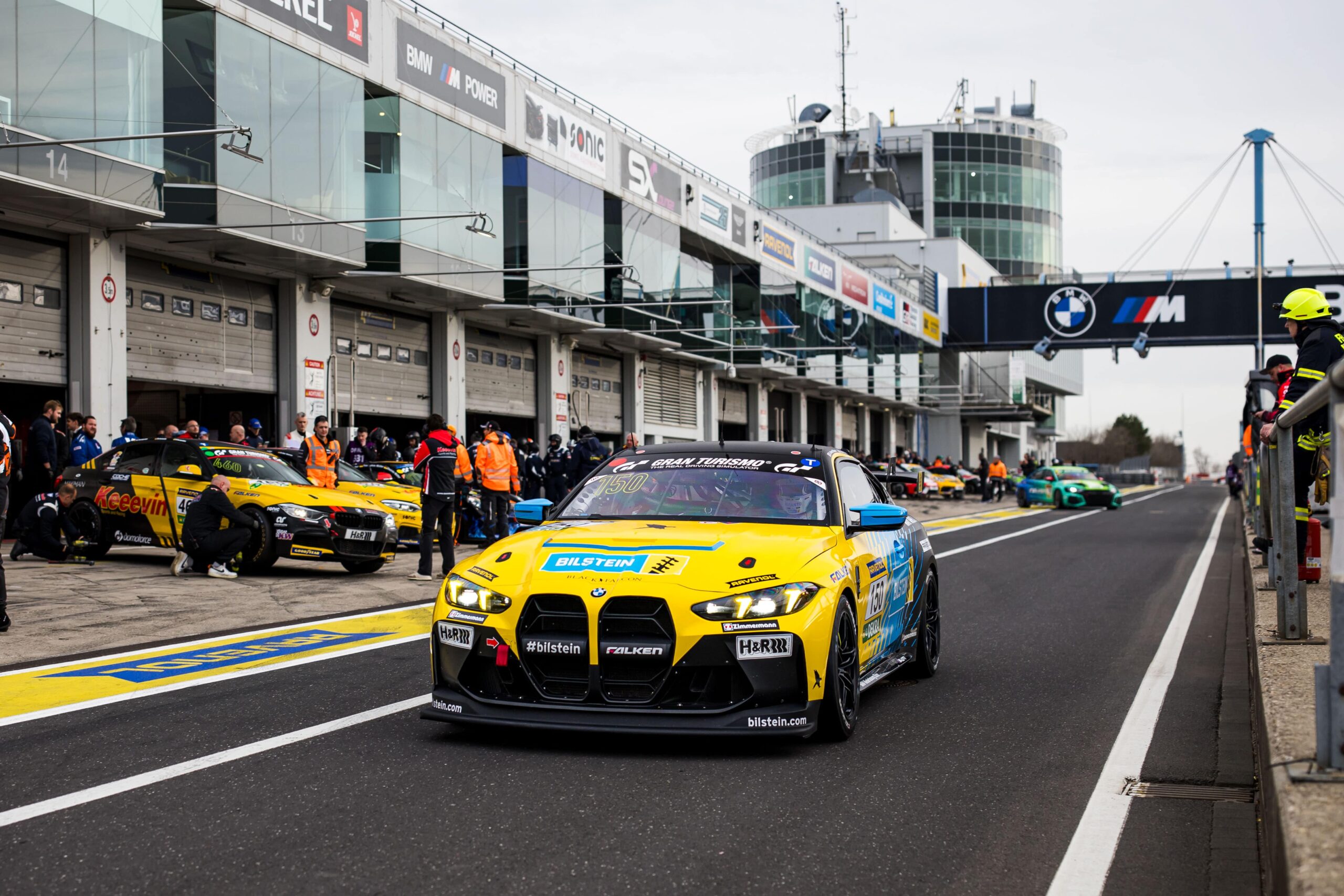 BILSTEIN Race Car leaving the pit lane at the Nürburgring, other racing cars in the background